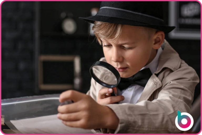 Ofsted-2025-image-Boy-holding-a-magnifying-glass-like-a-detective