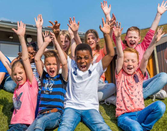 A group of children cheering